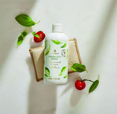 Thymes Soft Surface Scrub bottle label highlights baking soda for stain removal.