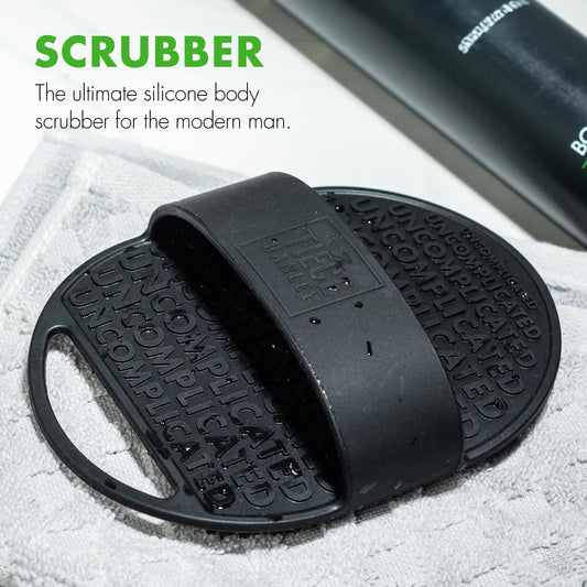 Tiege Hanley scrubber with ergonomic handle for comfortable exfoliation.