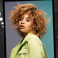 Applied on wet hair, this foam primes lift before blow-drying.
