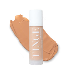 TINGE Body Makeup bottle swatch shows natural, long-wear coverage for an even skin tone