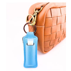 TINY SEED Blue lip balm holder keychain; keeps balms within reach on the go