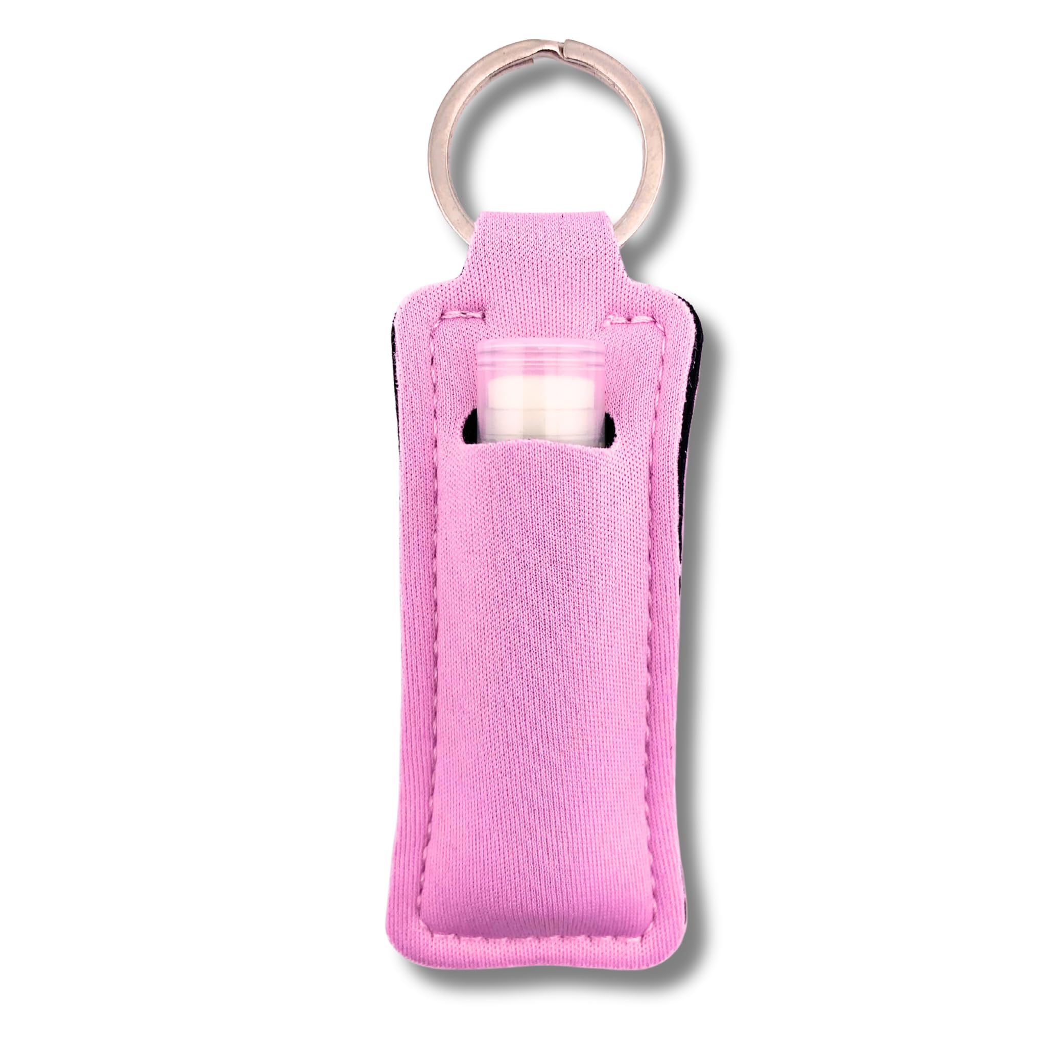 TINY SEED pink neoprene lip balm holder keychain attached to a purse.
