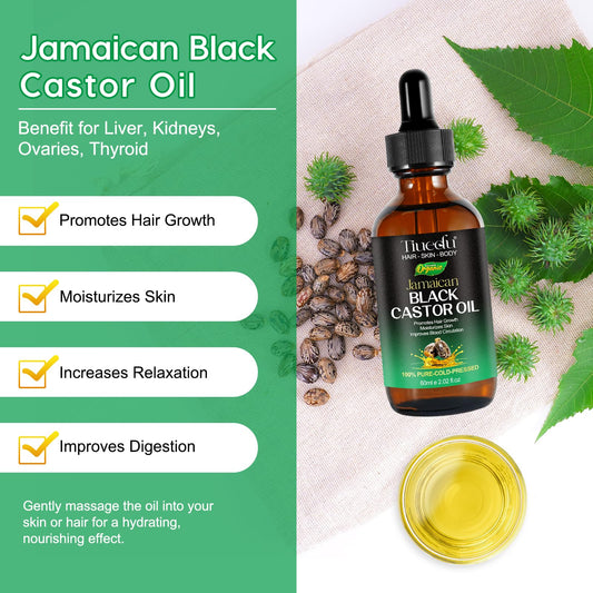 Tiuedu Jamaican Black Castor Oil dropper for precise application.