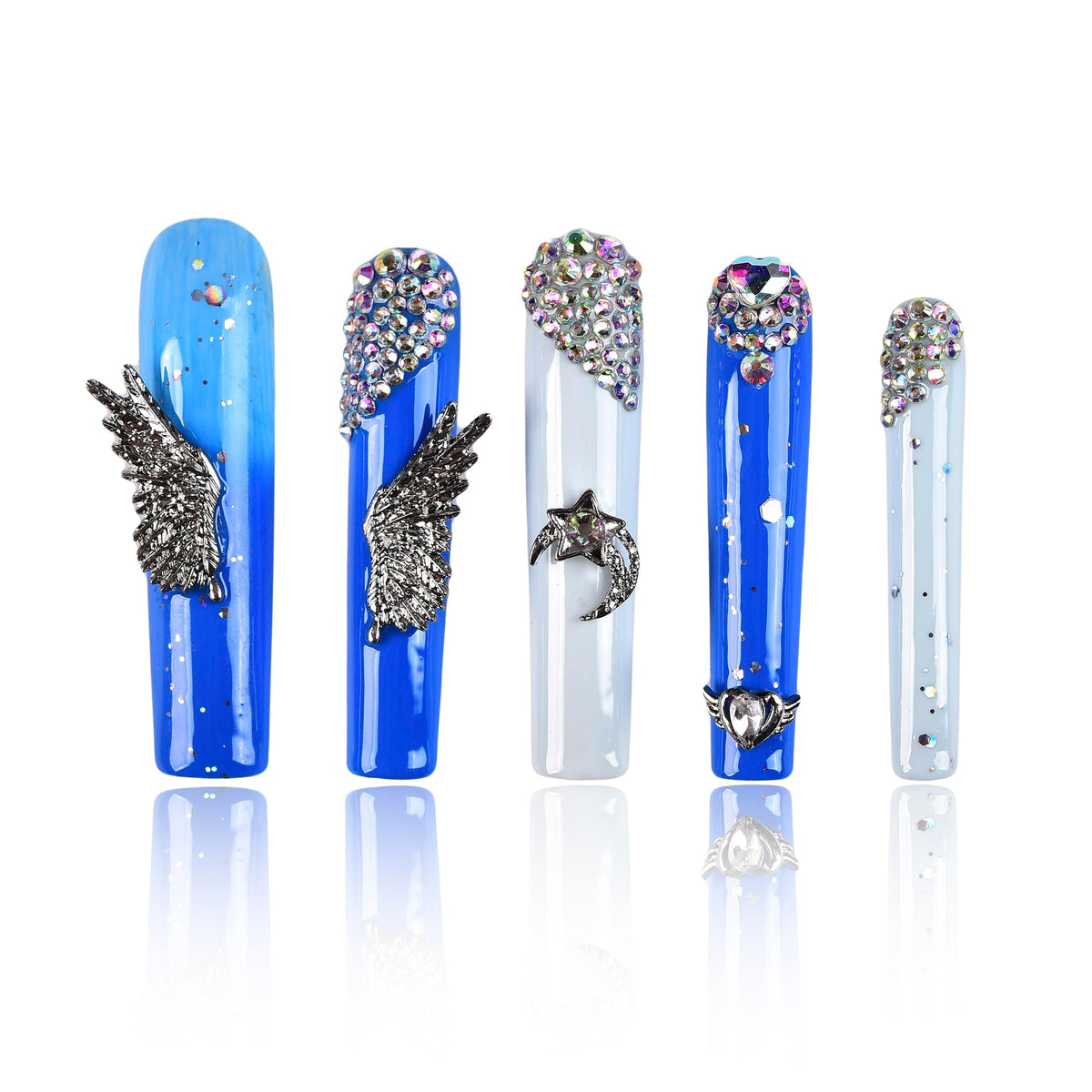 Tmani extra-long nails with crystal decor for a glamorous party-ready look.