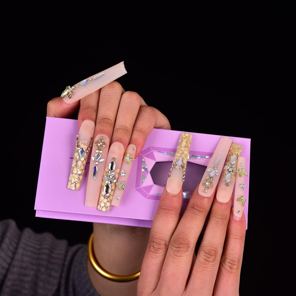 Close-up of handmade Tmani nails showing expert craftsmanship.