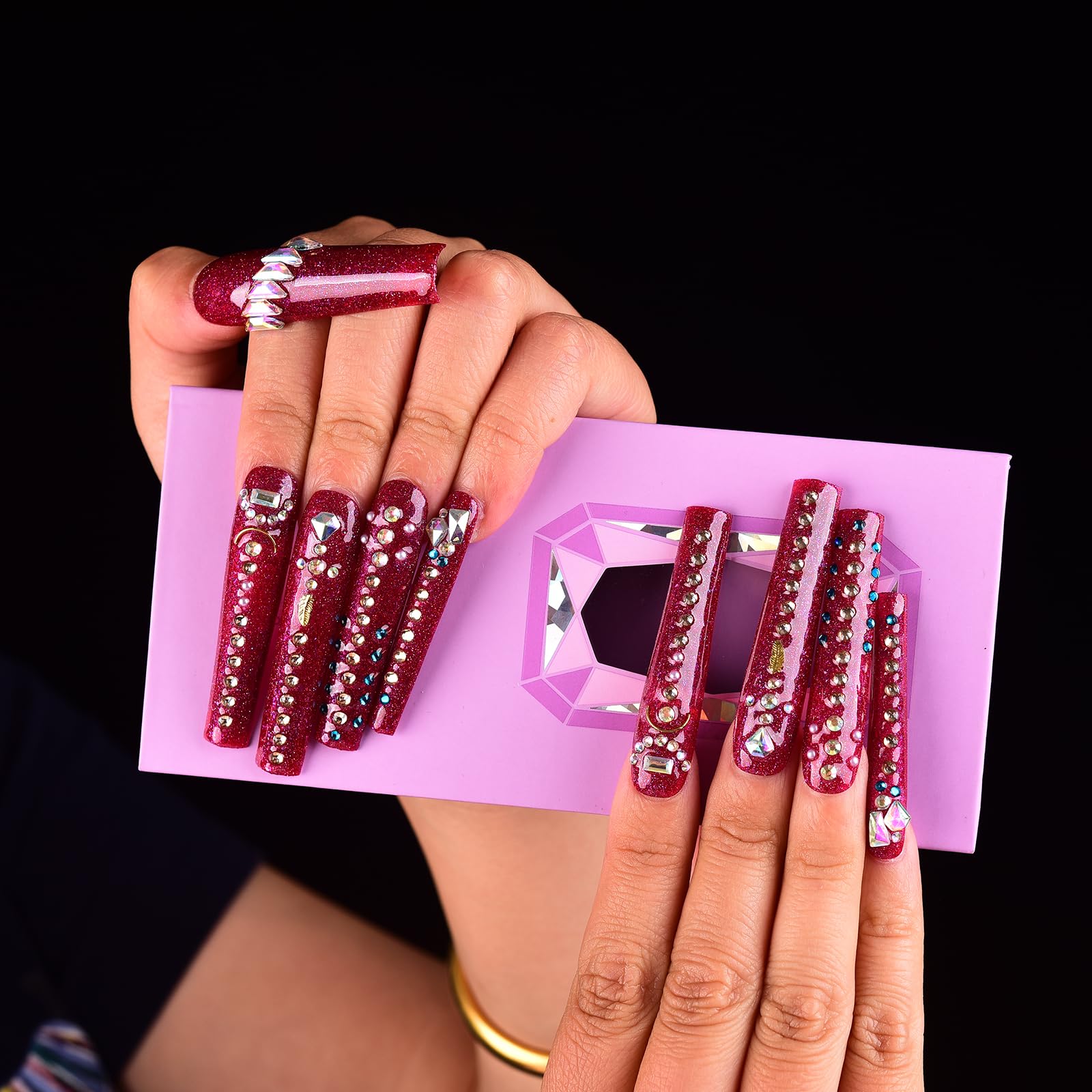 Tmani included nail file and glue for quick at-home application.