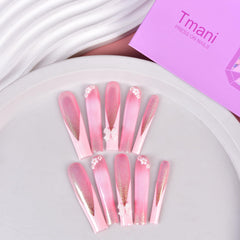 Tmani 10pc press-on nails in a purple storage case for travel-friendly manicure.