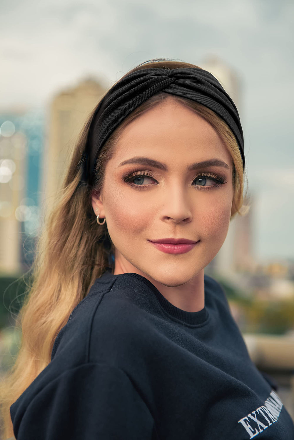 Tobeffect twist-knot headband adds subtle style while framing your face.