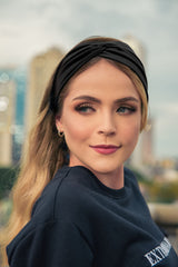 Tobeffect twist-knot headband adds subtle style while framing your face.