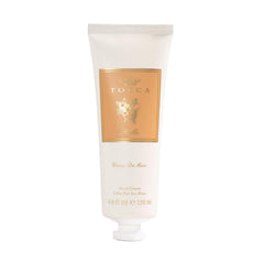 TOCCA Stella hand cream on a vanity implies elegant gifting or daily luxury.