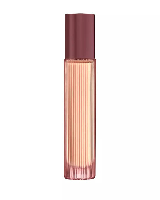 Tom Ford Cafe Rose EDP bottle in rosey pink glass, ideal for evening wear.