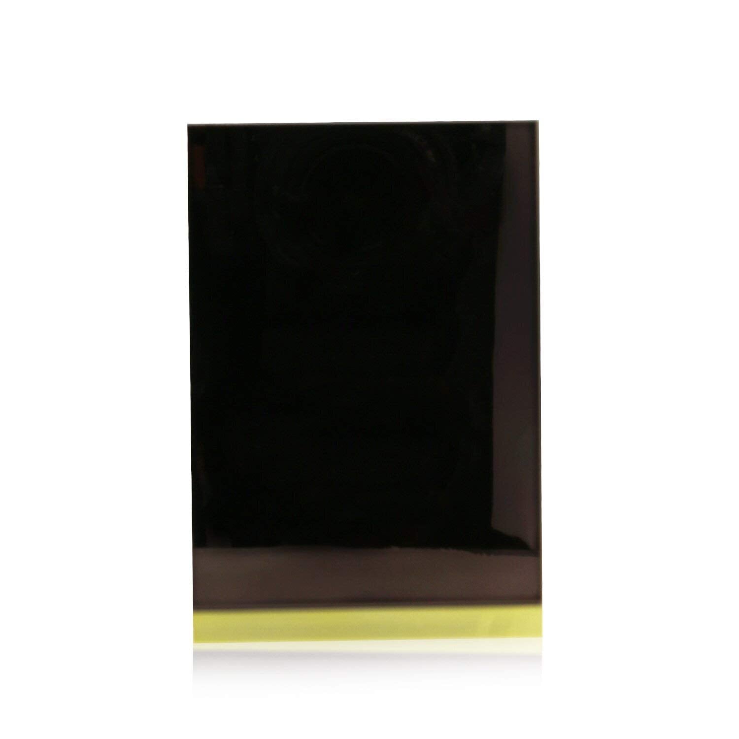 Tom Ford Eye Color Quad Suspicion close-up shows smooth texture for seamless blending.