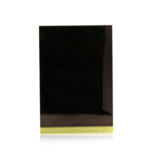 Tom Ford Eye Color Quad Suspicion close-up shows smooth texture for seamless blending.
