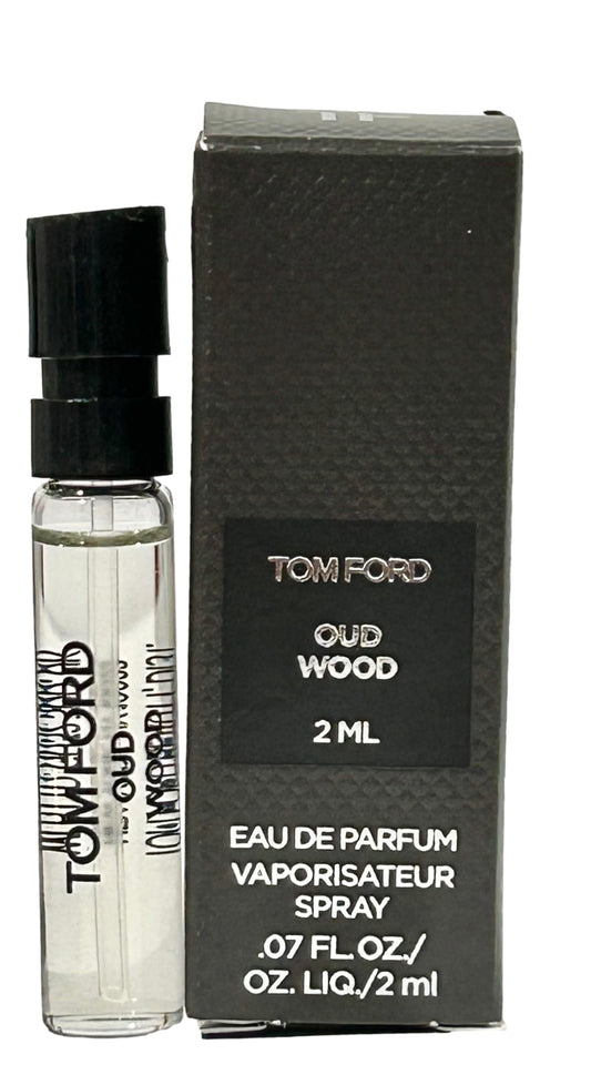 Tom Ford Oud Wood bottle front view showing premium scent branding for gifting.