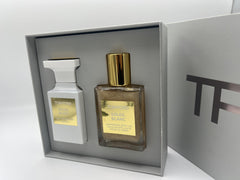 Tom Ford Soleil Blanc shimmering body oil bottle, delivers radiant skin glow.