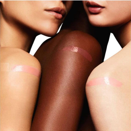Tom Ford Soleil Soleil Liquid Lip Blush shows gold flecks for luxe gloss and a subtle pink shift.