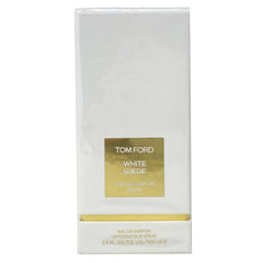 Tom Ford White Suede EDP bottle pour, emphasizing long-lasting, musk-forward fragrance for daily elegance.