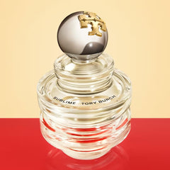 Tory Burch Sublime spray shot illustrating easy application and scent diffusion.