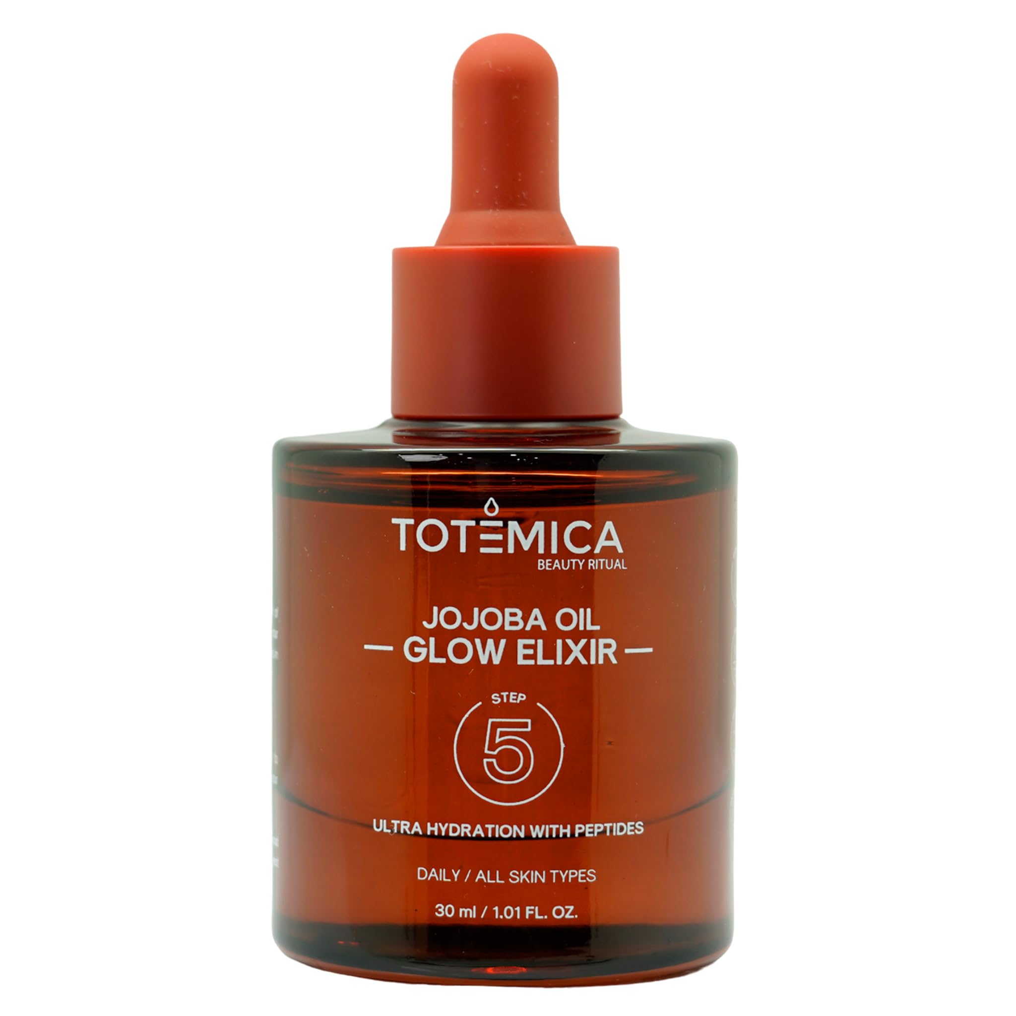 TOTEMICA Jojoba Oil Glow Elixir bottle close-up for hydration and radiance.