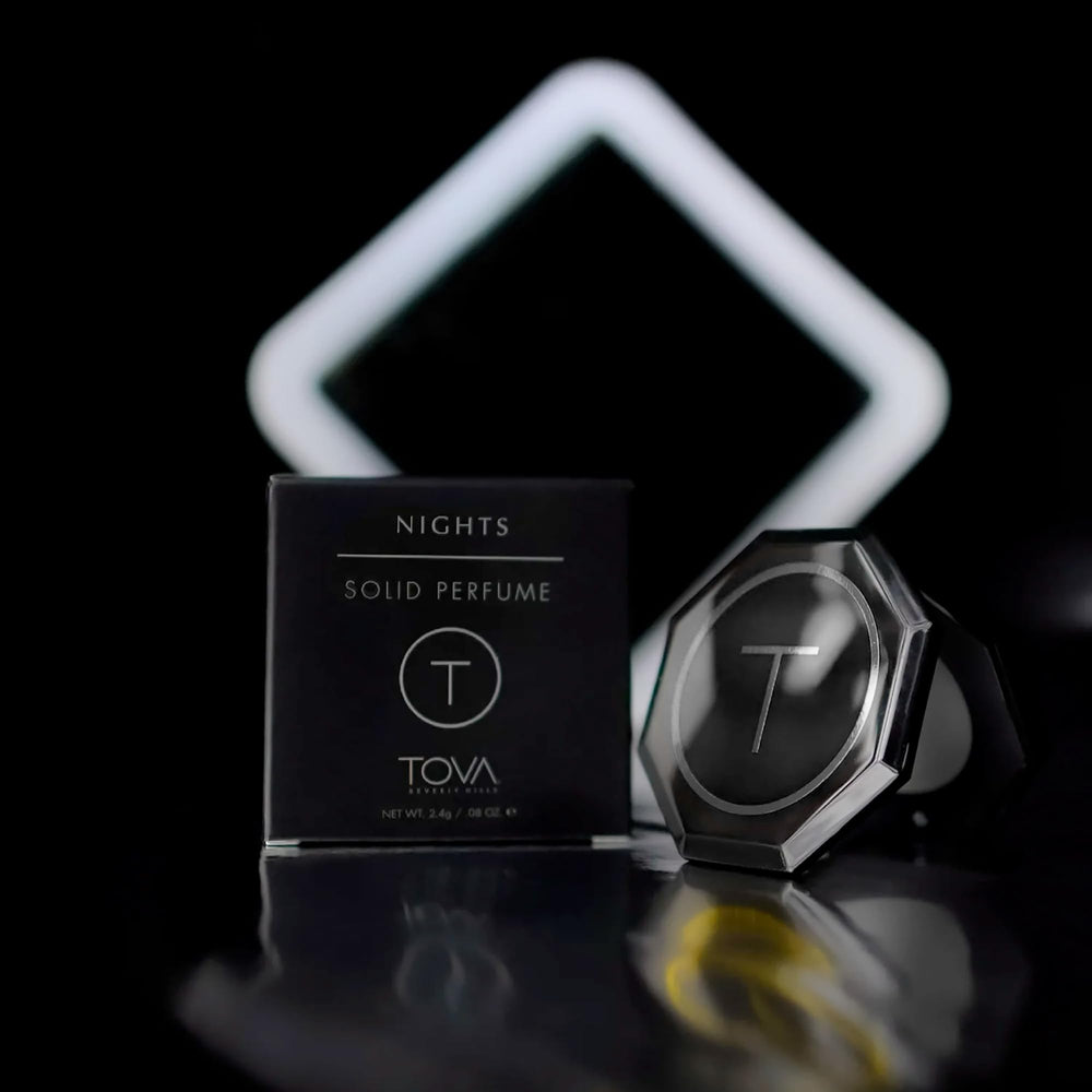 TOVA Nights compact open view highlighting easy access to fragrance.