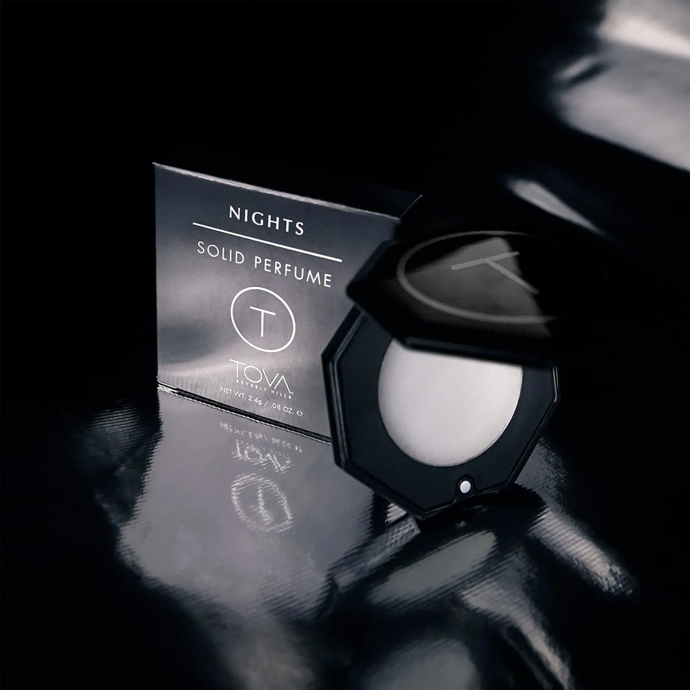 TOVA Nights solid perfume compact side profile showing sleek portability.