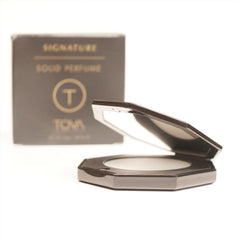 TOVA Signature Solid Perfume Compact bergamot-jasmine close-up, highlighting natural oils.