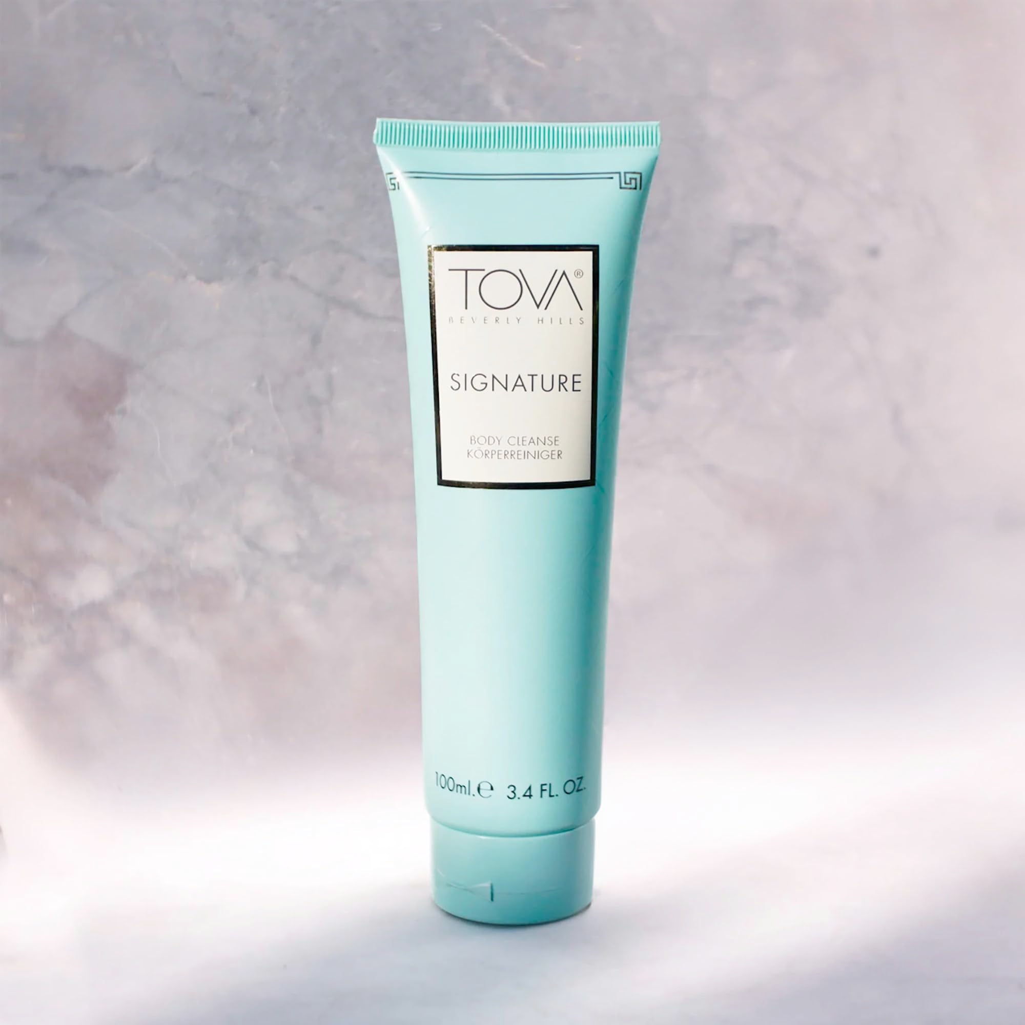 Pour shot of Tova Signature Body Cleanse highlighting easy dispensing and gentle cleanse