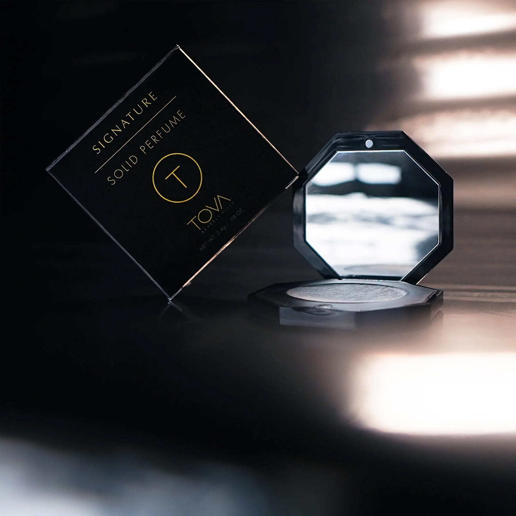 TOVA Signature Solid Perfume Compact packaging portrait for travel-friendly luxury.