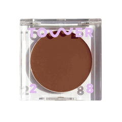 Tower 28 Sculptino Cream Contour Hammer swirl for natural cheek definition.