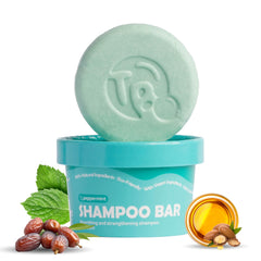Tree Bottle castor oil biotin shampoo bar nourishes scalp and adds volume.