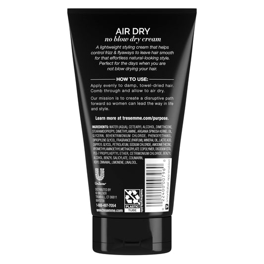 TRESemmé Air Dry Smoothing Cream application on damp hair for even distribution.