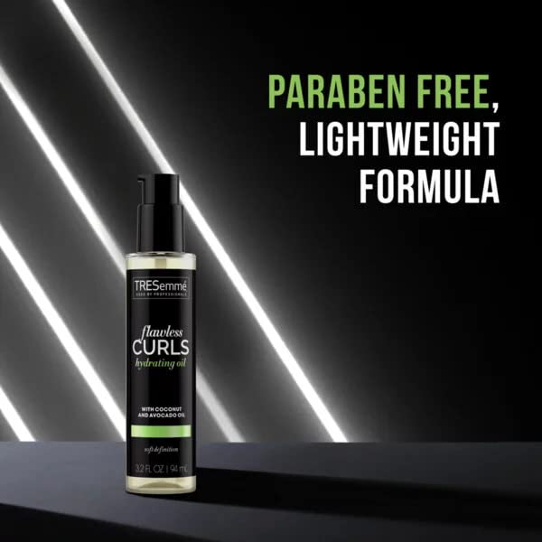 TRESemmé Flawless Curls Hydrating Oil in hair for frizz control and shine