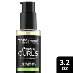 TRESemmé Flawless Curls Hydrating Oil packaging for travel-friendly care