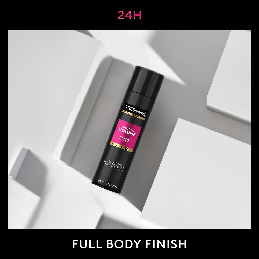 TRESemmé Total Volume hairspray demonstrates anti-frizz control and smooth finish