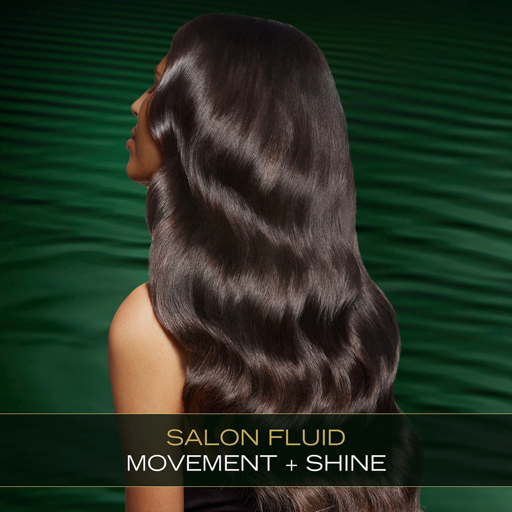 Rich lather from the Pro Infusion Fluid Smooth Shampoo during application