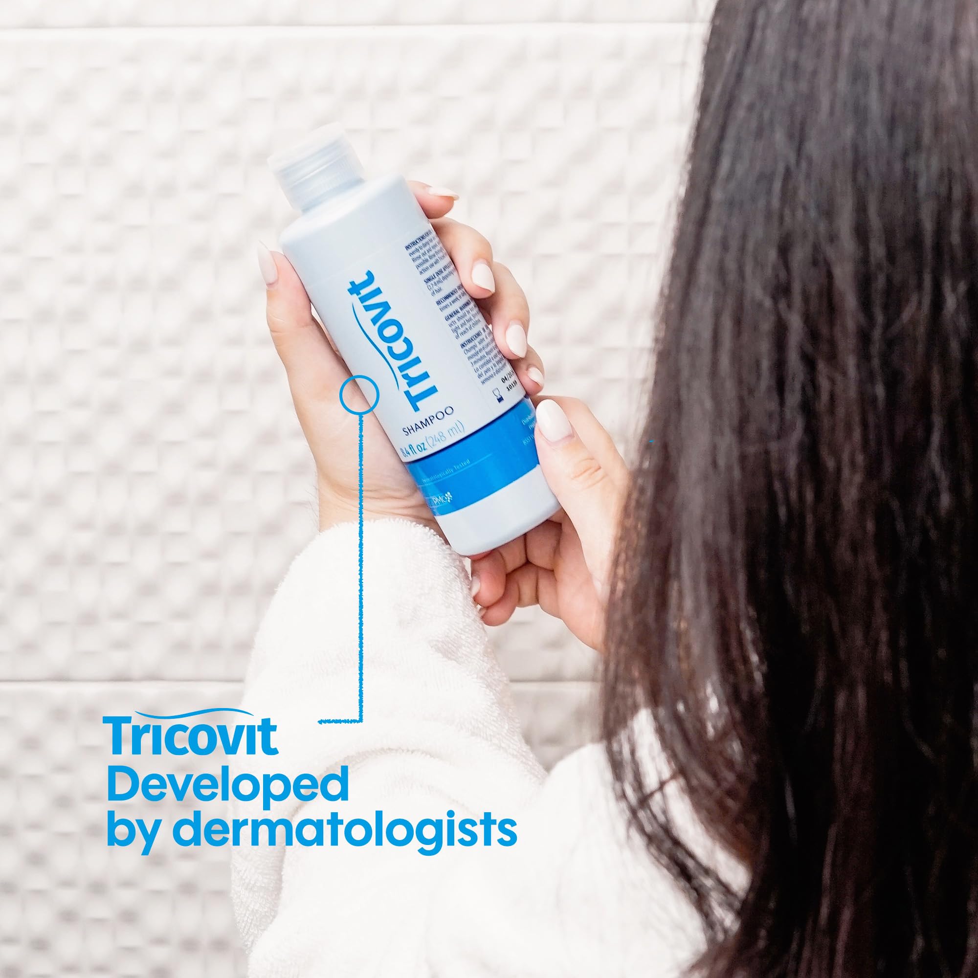 Tricovit color-safe formula close-up on healthy hair shafts.