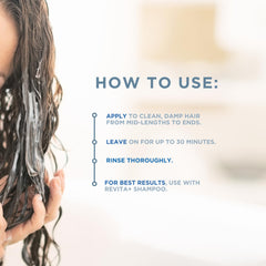 Hand applying Revita+ conditioner to damp hair for even coverage
