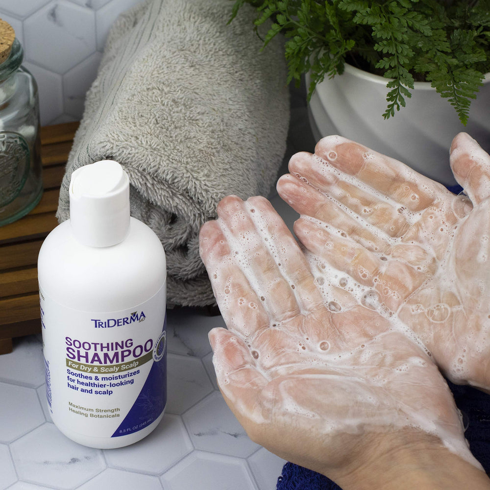 TriDerma Soothing Shampoo scalp application, massaging to exfoliate dry buildup.
