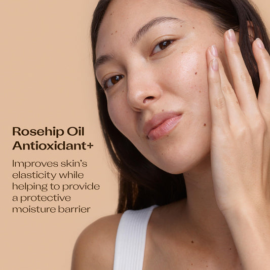 Trilogy Rosehip Oil dropper close-up showing precise, mess-free application.