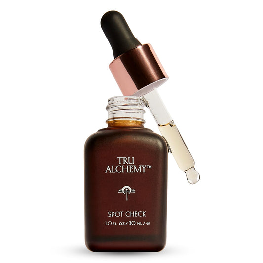 Tru Alchemy Spot Check bottle pour shows serum texture for easy application