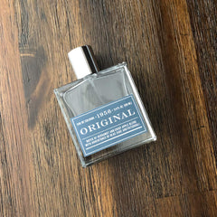 Tru Fragrance Beauty 1956 Original logo close-up on bottle