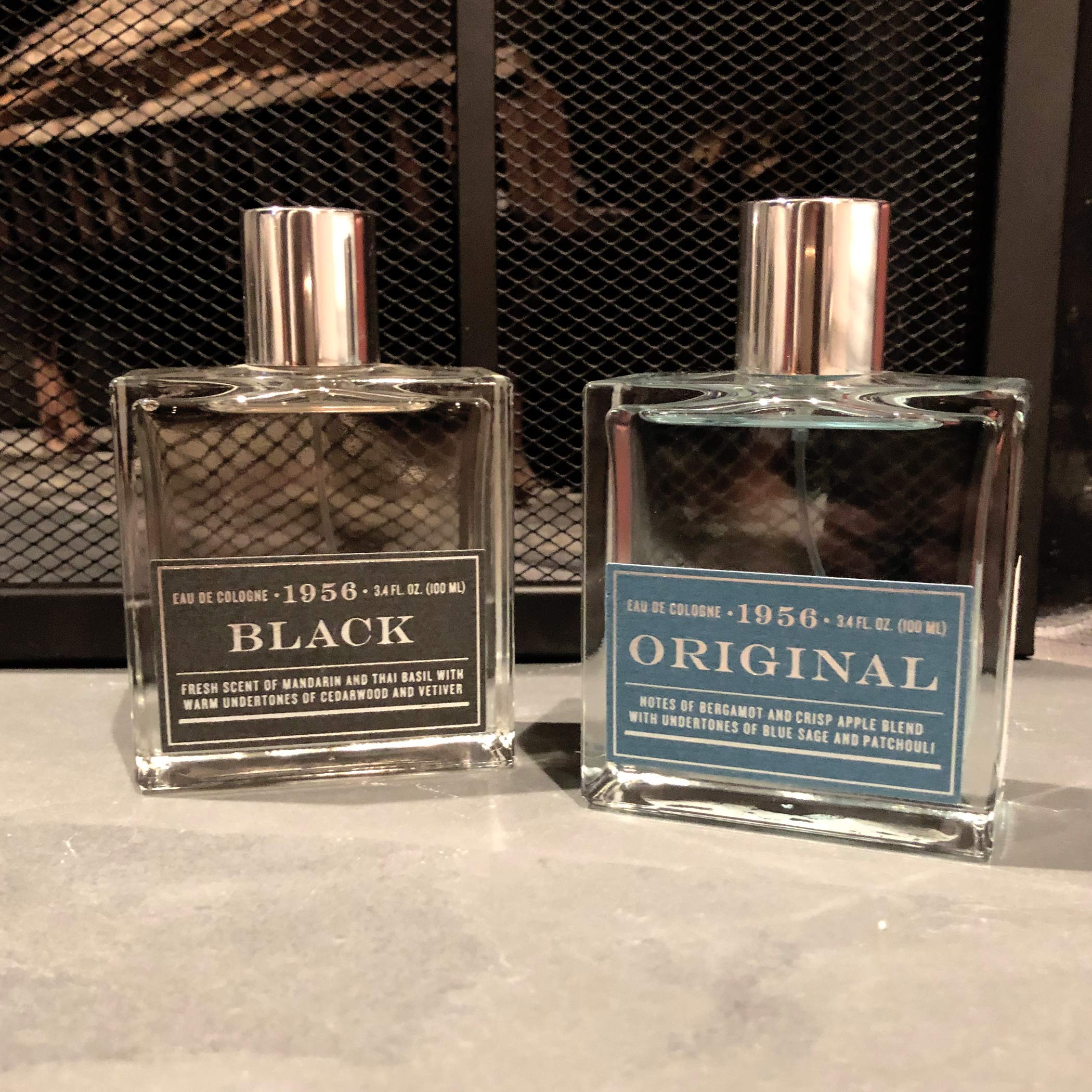 Tru Fragrance Beauty 1956 Black bottle on a shelf complements modern wardrobes.