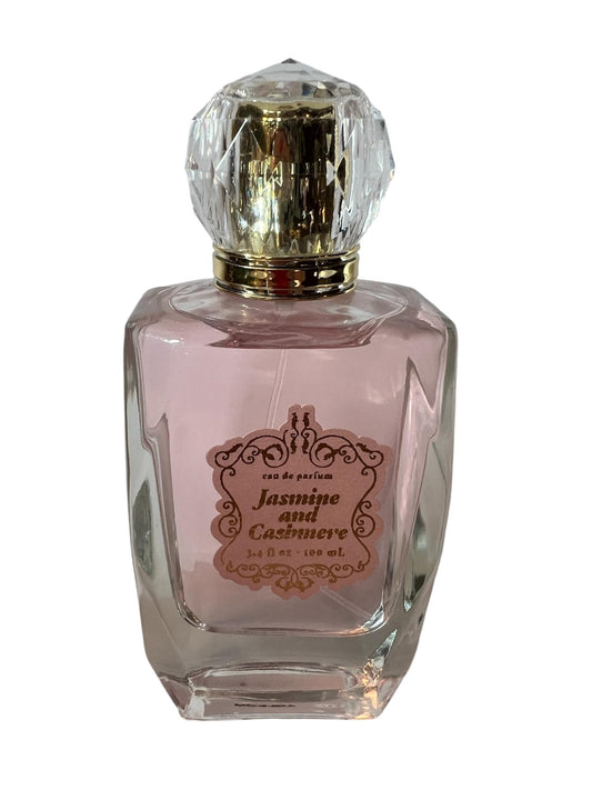 Tru Fragrance Jasmine & Cashmere bottle with crystal top enhances vanity display.
