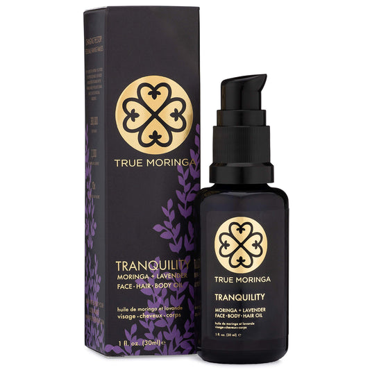 True Moringa Oil bottle pour shows pure, lightweight skin nourishment.