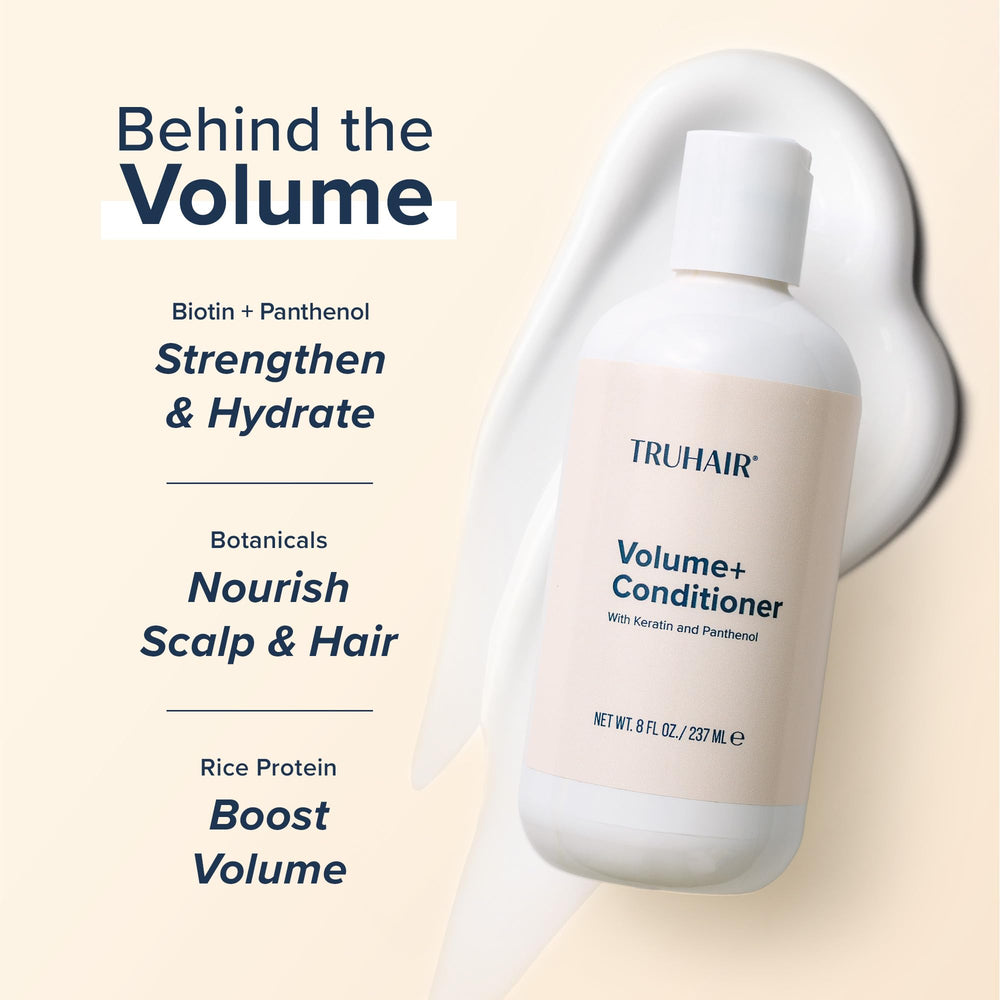 Truhair Volume+ application on damp hair for even distribution and softness.