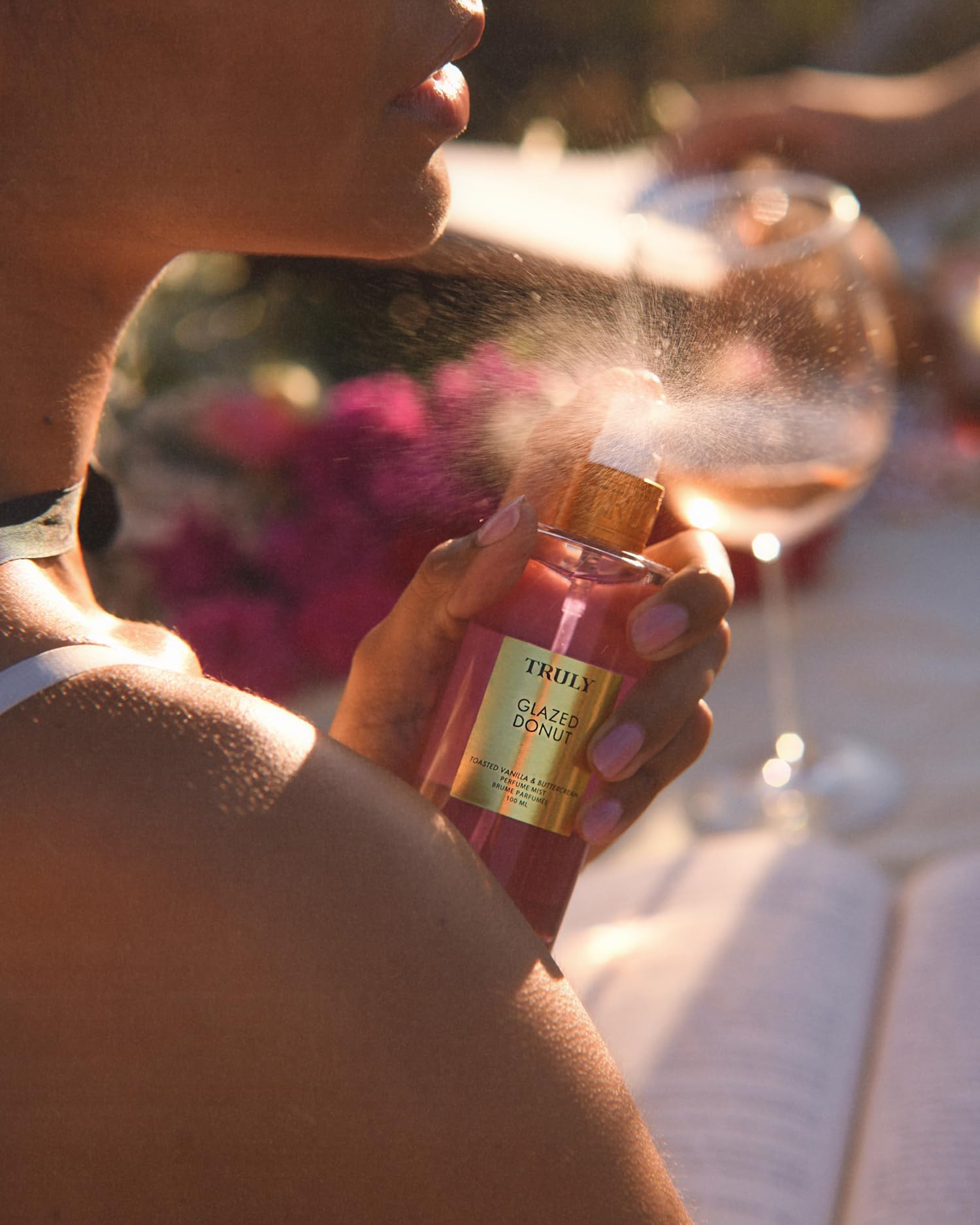 Truly Glazed Donut bottle display hints at premium gourmand experience.