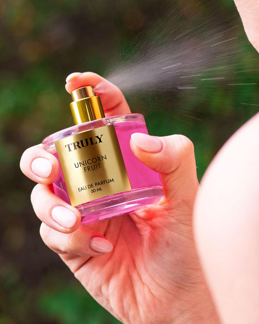Close-up of spray mist from Truly Unicorn Fruit EDP for light daily wear.