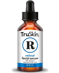 TruSkin Retinol Serum bottle pour highlights smooth skin renewal overnight.