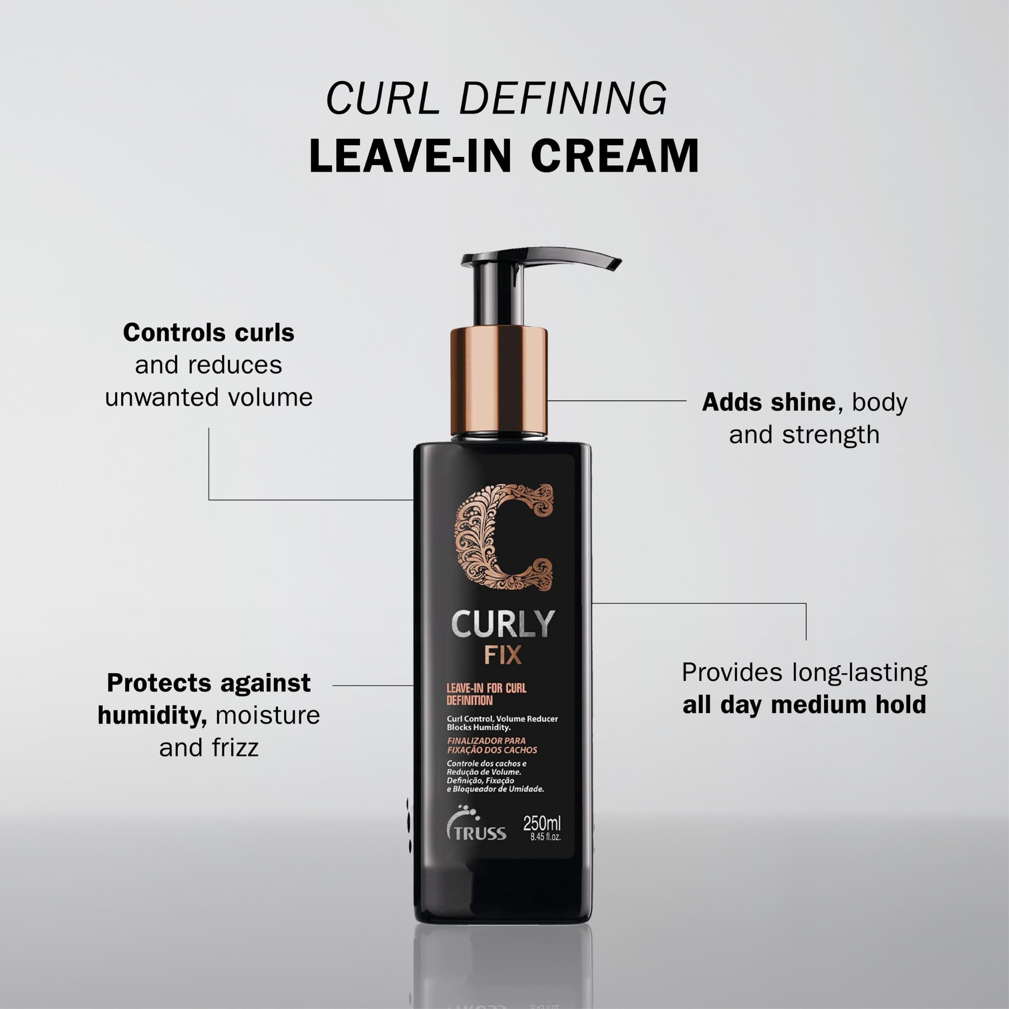 Hands applying TRUSS Curly Fix cream to damp hair for styling.