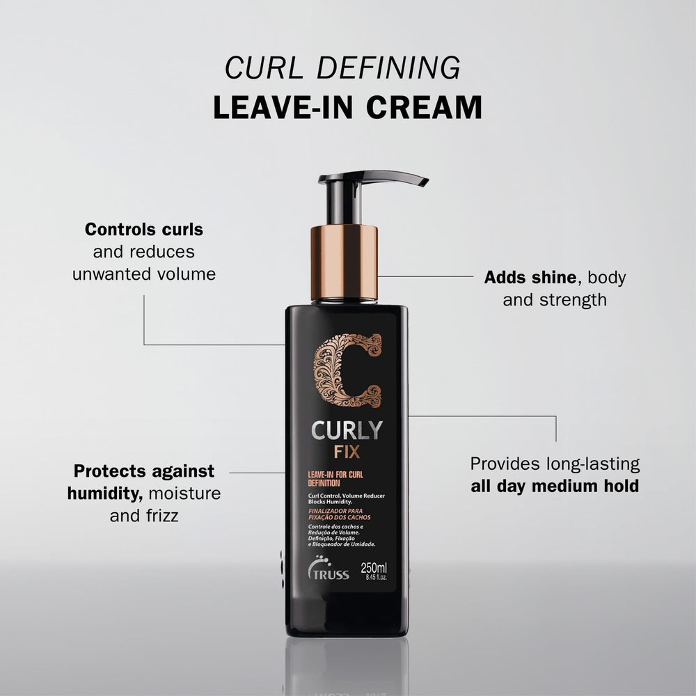 Hands applying TRUSS Curly Fix cream to damp hair for styling.